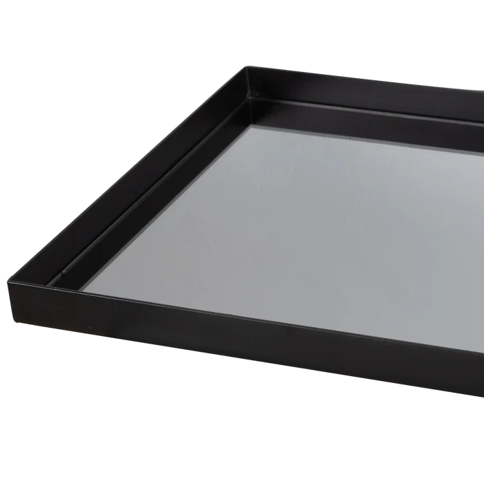Characterized by its confident presence and its luxurious build quality, the Reflect Long Rectangular Tray is defined by its clean, sharp lines and its elevation of simple forms.