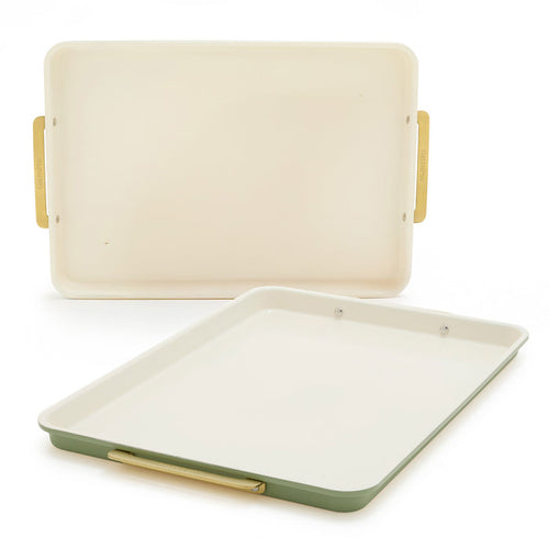 Two sage green half sheet pans with cream interiors and gold handles, set of two, shown on a white background.