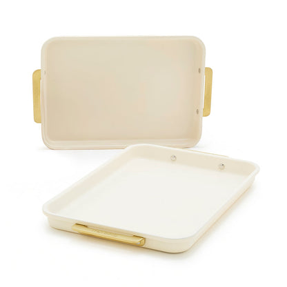Two cream-colored sheet pans with gold handles, shown as a 2-piece bakeware set.