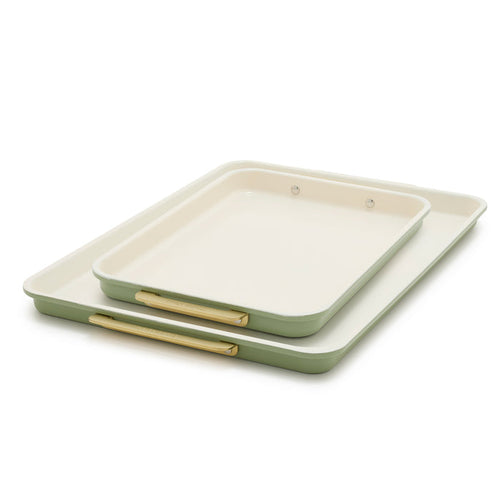 Two sage green sheet pans with cream interiors and gold handles, shown as a 2-piece bakeware set.