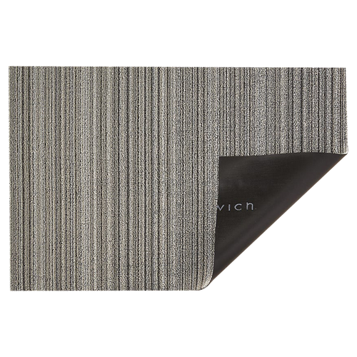 Wonderfully striped, the textured "looped" look of this Shag Mat is tufted from durable extruded yarns.