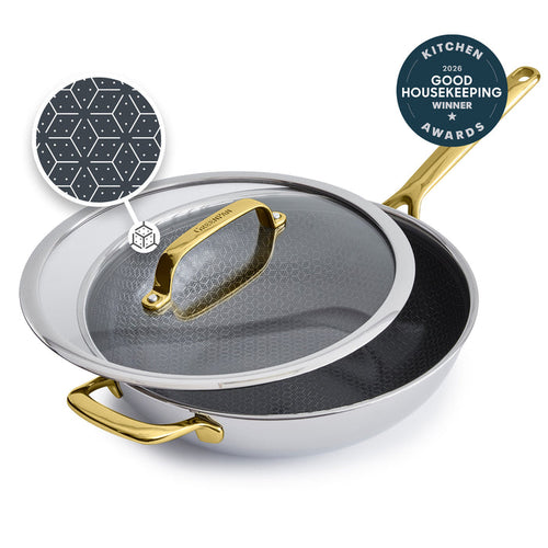 Gold ceramic-coated 12-inch wok with matching lid and gold handles, includes a Good Housekeeping 2026 badge.