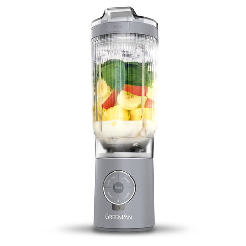 Portable blender with fruits inside on a white background, featuring the GreenPan brand.