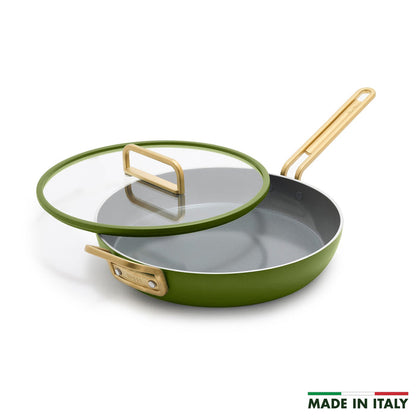Green ceramic frypan with gold handle and glass lid, 12-inch size. Brand name on the side.