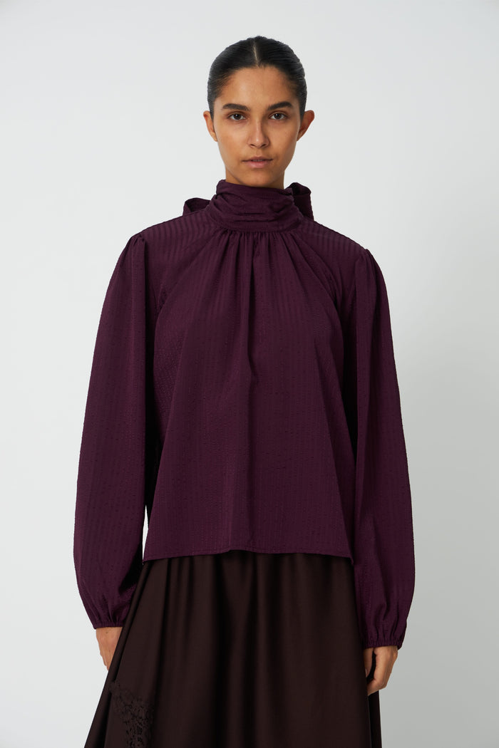 Model wearing Stella Nova Bow Blouse Beetroot by Stella Nova. Shop Stella Nova at Dotique