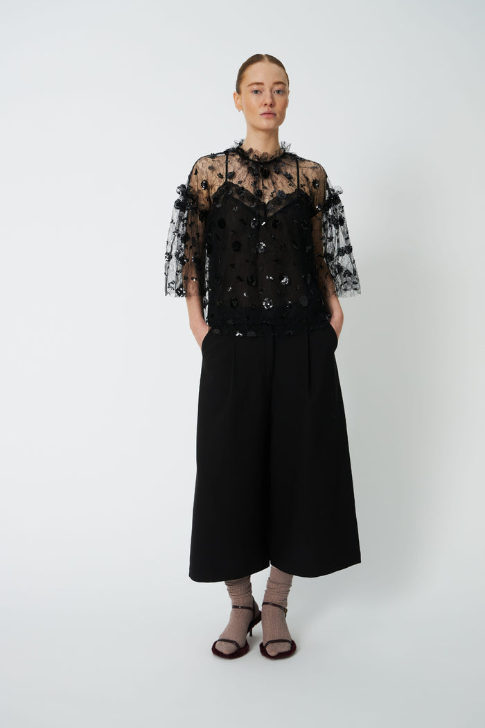 Model wearing Stella Nova Sequins Mesh Blouse. Shop Stella Nova at Dotique