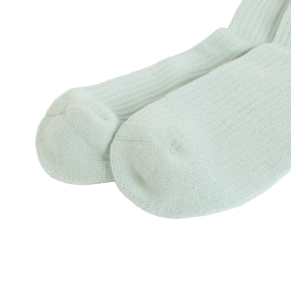 flat lays of blue puffin ribbed bamboo socks