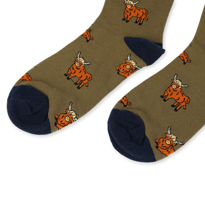 close up to green Highland cow bamboo socks