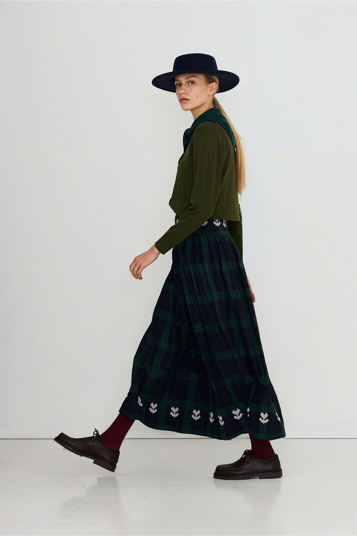 Tiny Big Sister Embroidered Check Skirt AW26-755 worn by model Shop Tiny Big Sister at Dotique