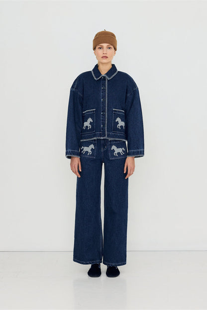 Tiny Big Sister Embroidered Horses Denim Trousers AW26-789 modeled in denim Shop Tiny Big Sister at Dotique